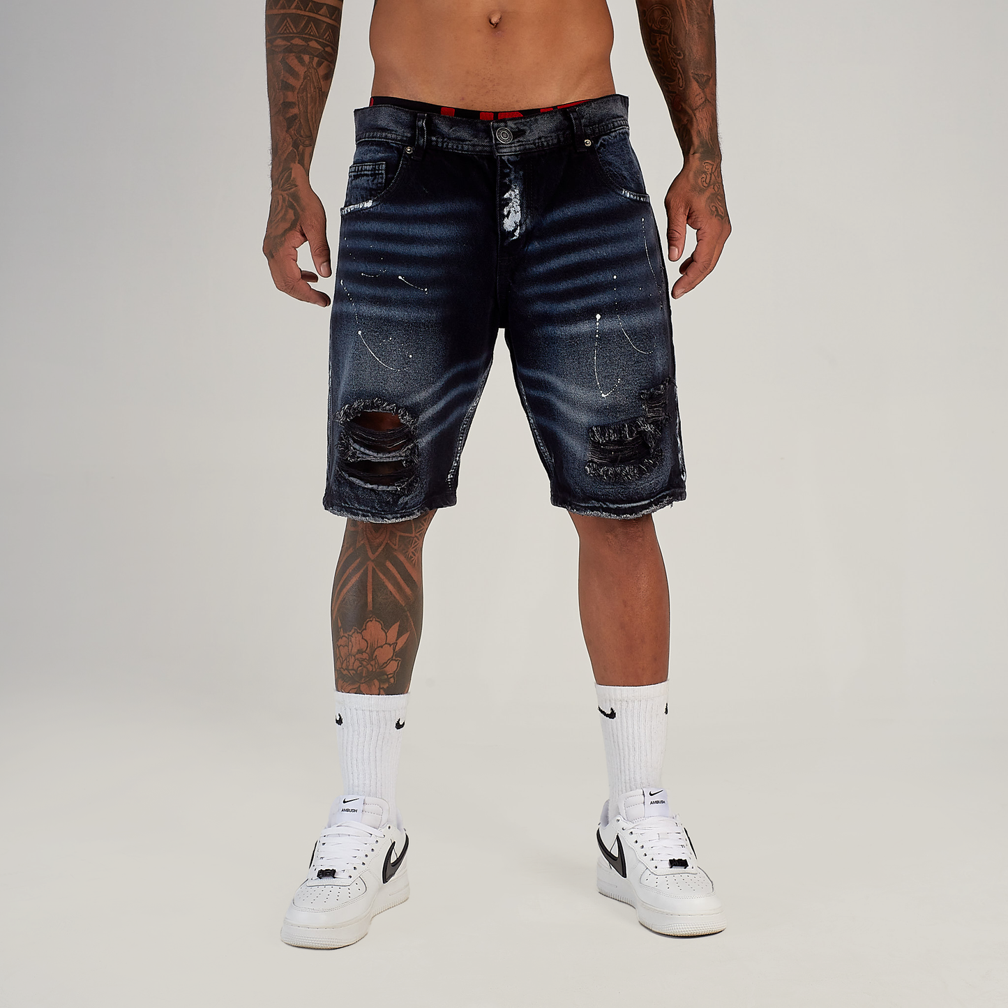 Bermuda Denim Unike Desgastada con Efecto Salpicado