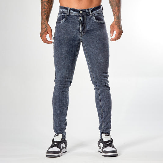 Jean caballero azul prelavado bordado gris