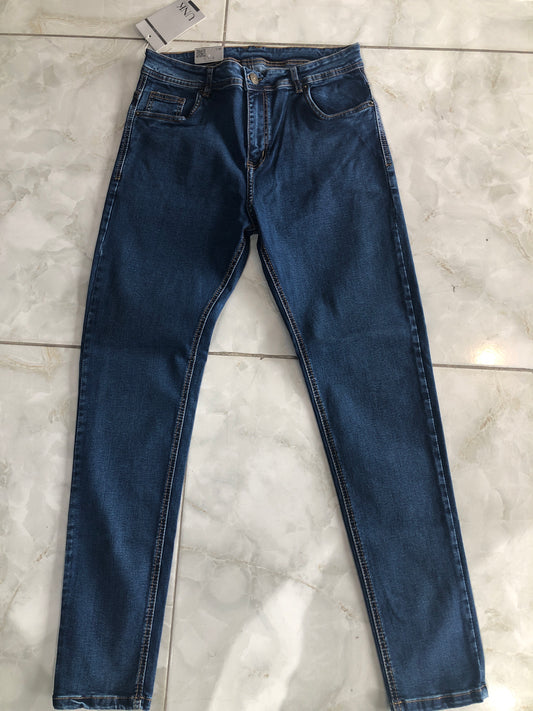 Jean caballero azul oscuro liso borde café