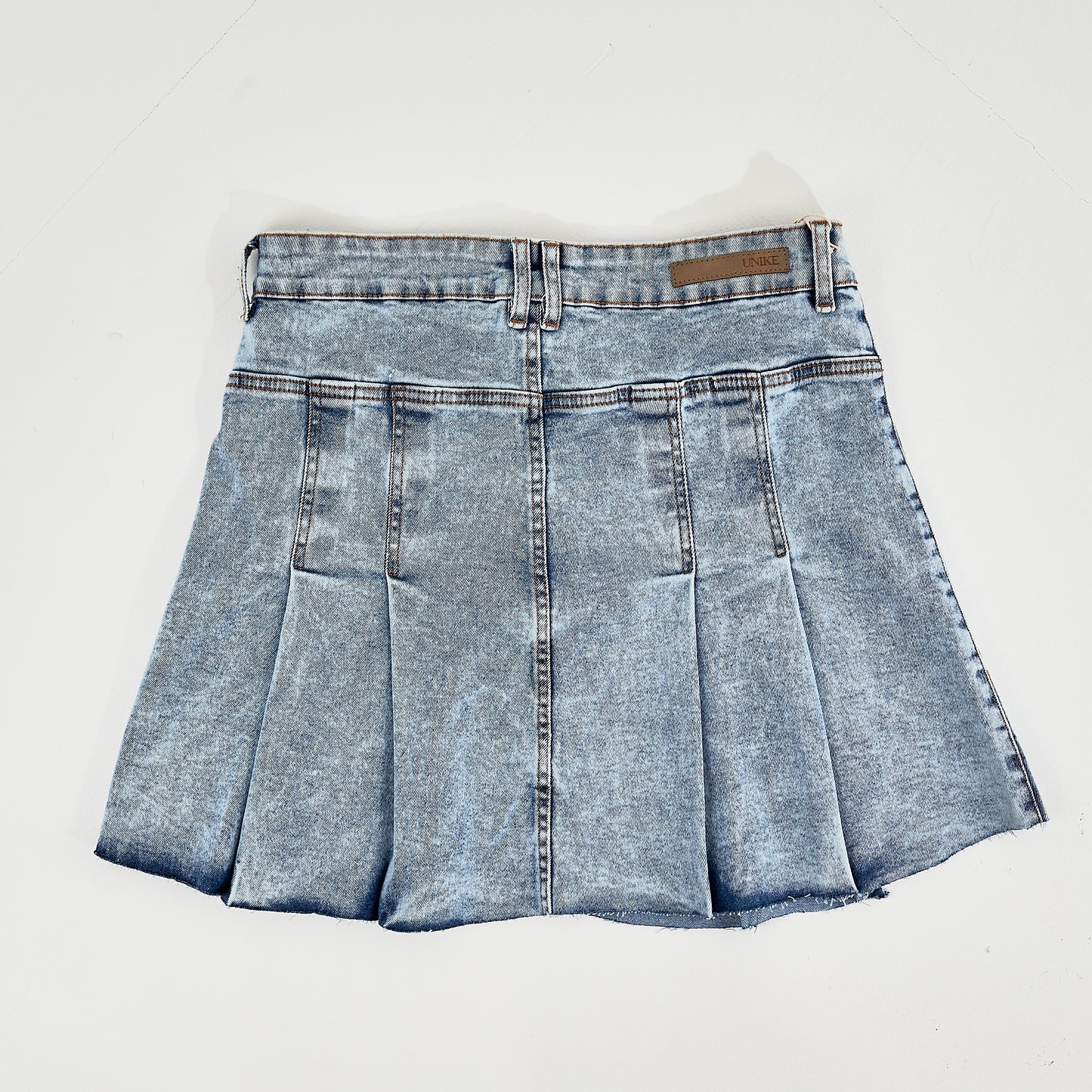 Falda de jean plisada oscura